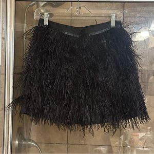 NEW WITH TAGS “QUEEN OF SPARKLES” BLACK FEATHER SKIRT